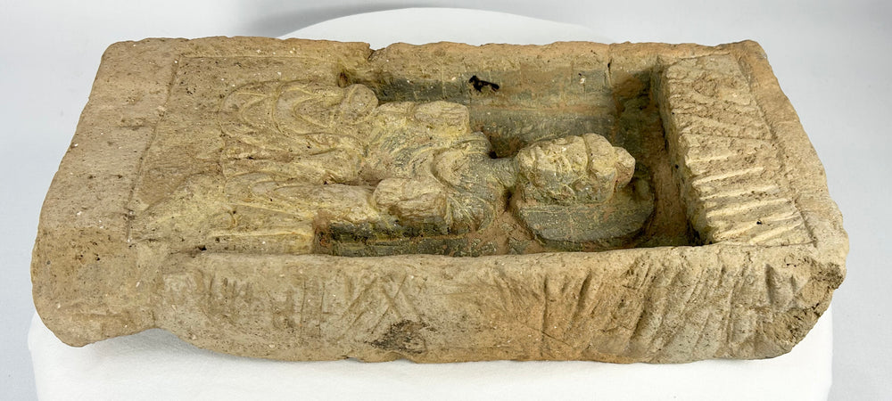 Ancient Chinese Buddhist brick with canopy and carved robes