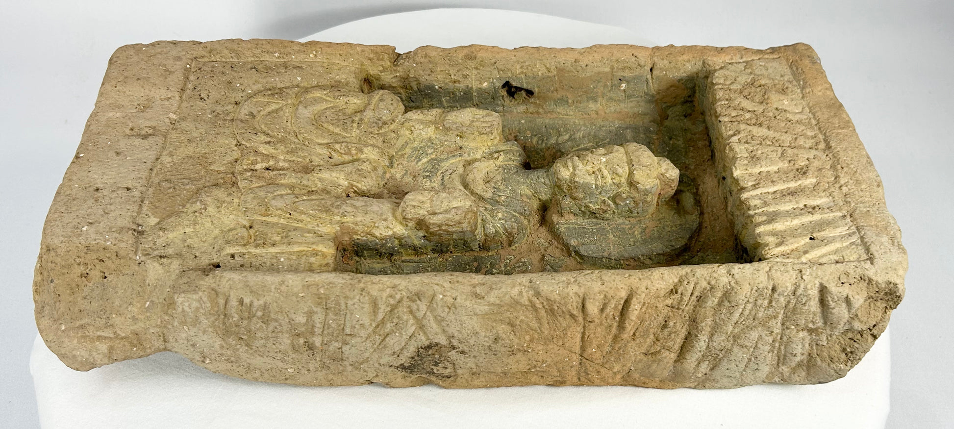 Ancient Chinese Buddhist brick with canopy and carved robes