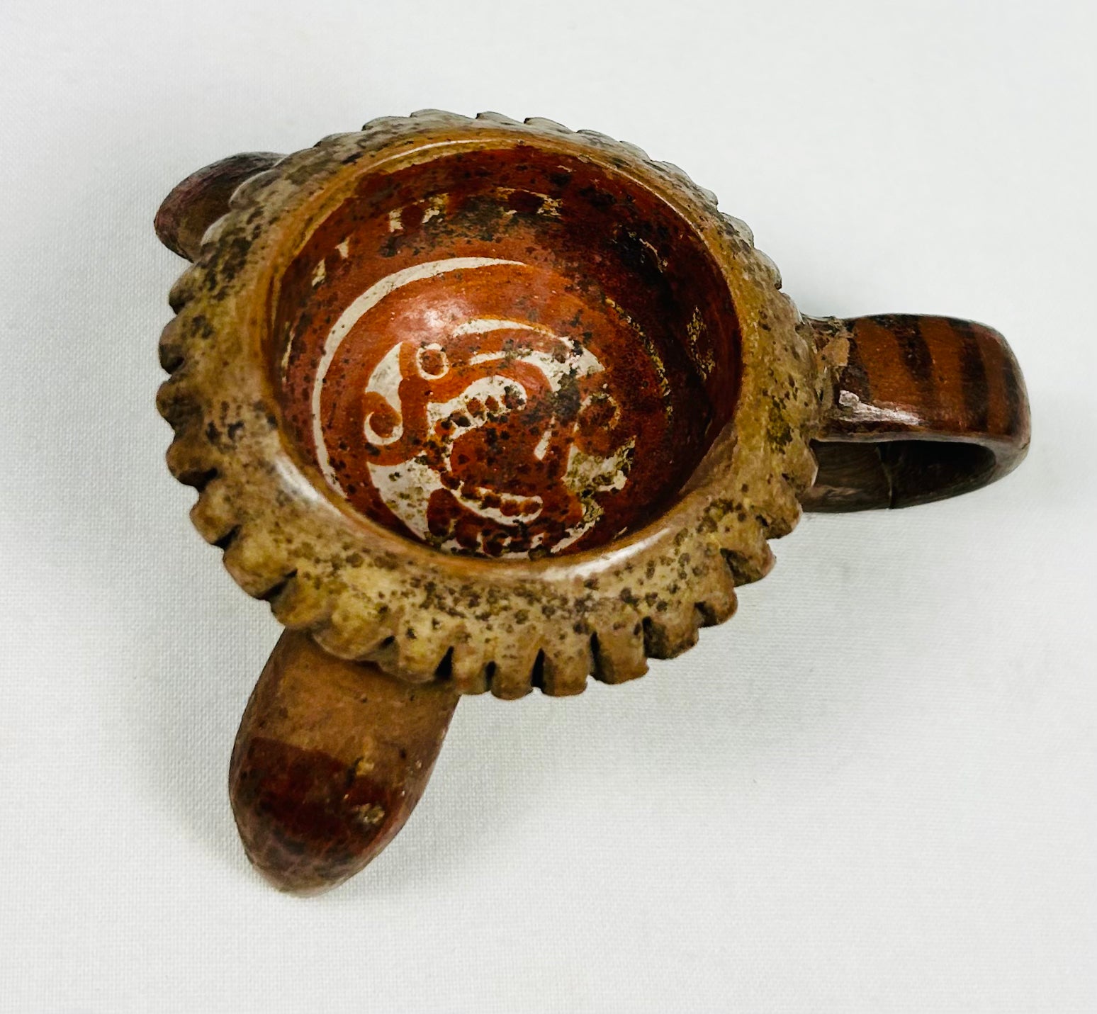 West Mexican ceremonial tripod vessel with looped leg support