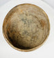 Pre-Columbian painted pottery bowl with rounded form and everted rim