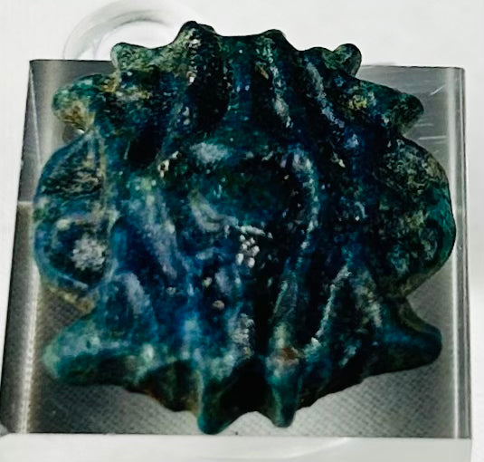 Authentic Egyptian faience amulet with mineral deposits and glaze weathering