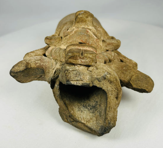 Ancient Mesoamerican terracotta ritual head with strong facial features
