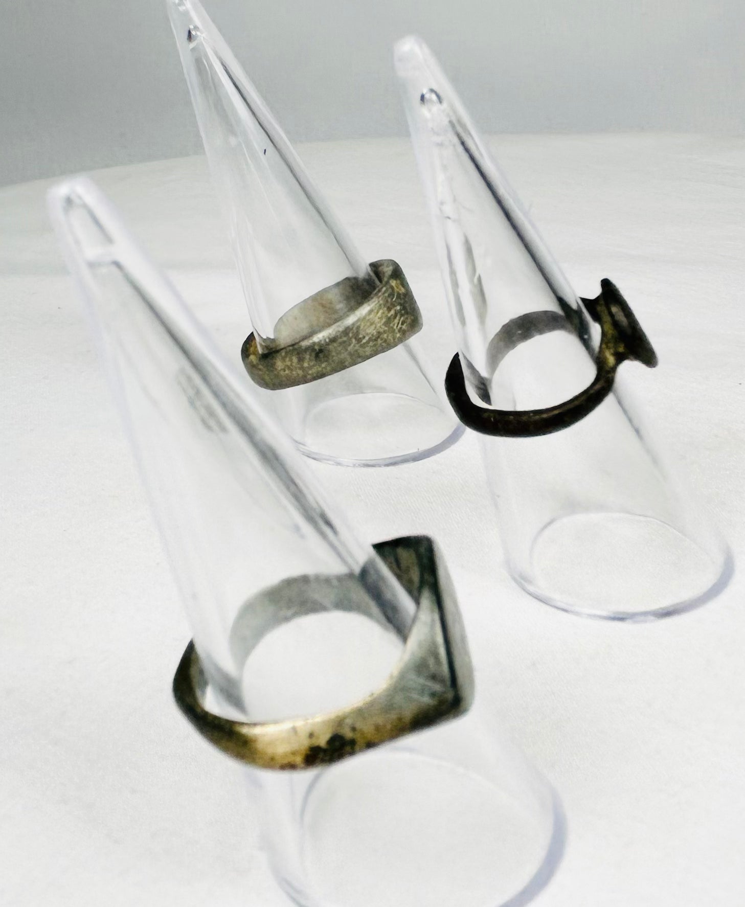 Museum-quality ancient bronze ring set with distinct historical styles