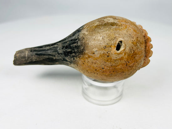 Pre-Columbian terracotta ritual rattle group including spherical and gourd-shaped forms, circa 300 BCE–900 CE.