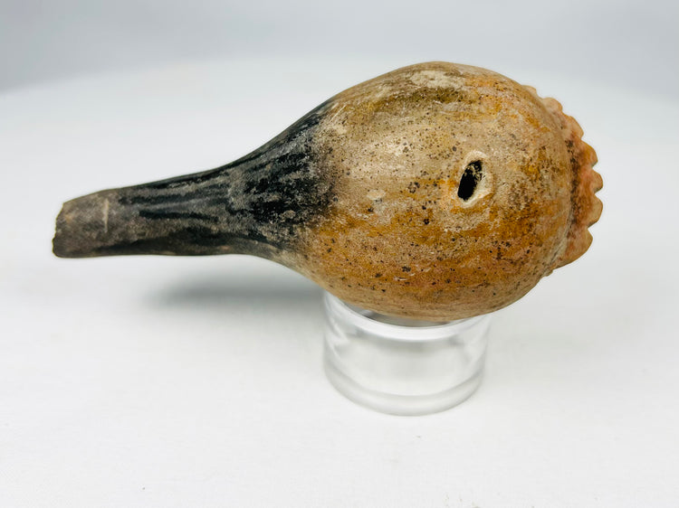 Pre-Columbian terracotta ritual rattle group including spherical and gourd-shaped forms, circa 300 BCE–900 CE.