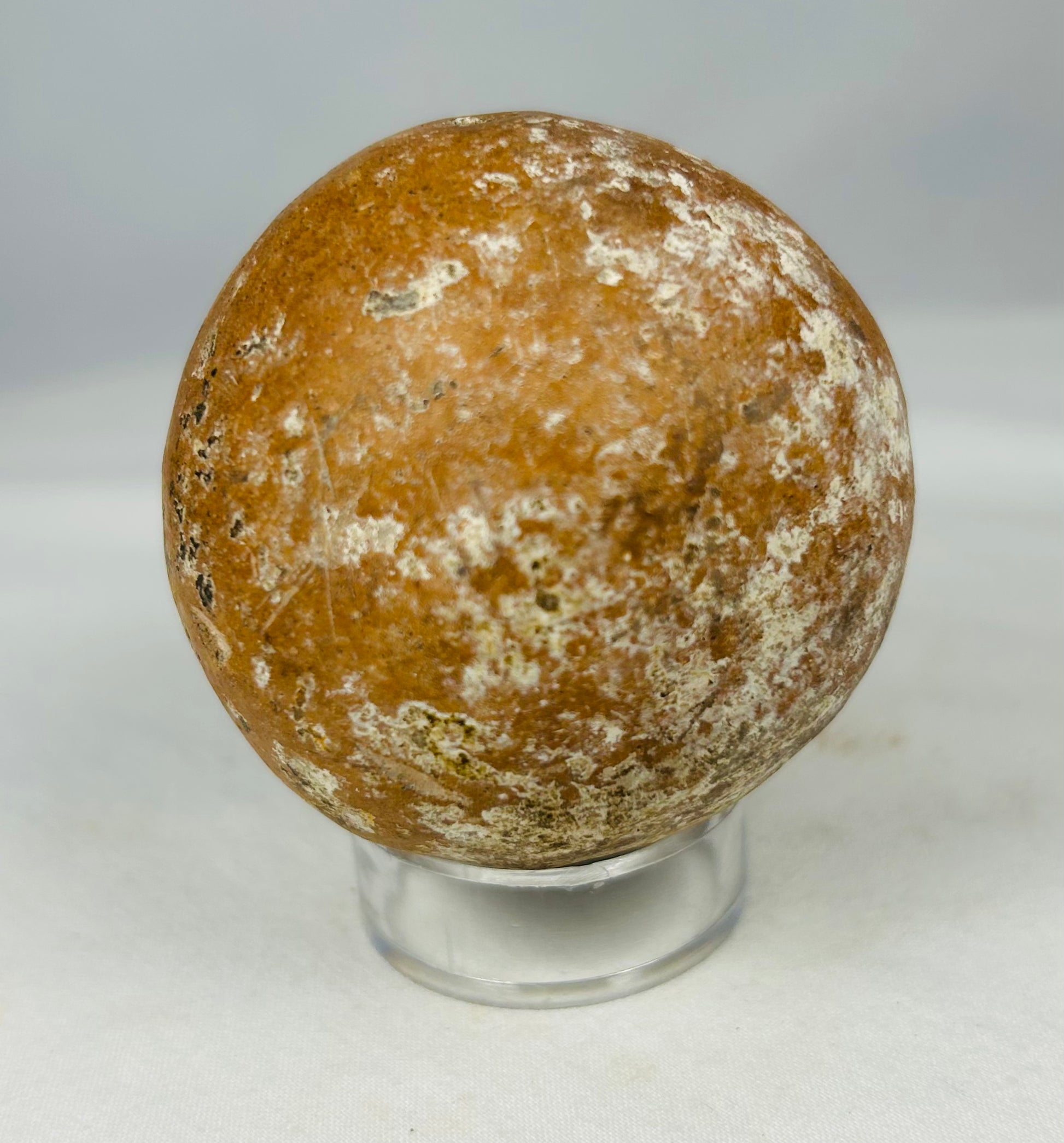 Group of ancient clay rattles from Pre-Columbian Mesoamerica with hollow construction and intact sound function.