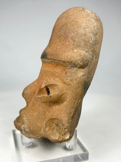 Authentic Pre-Columbian terracotta sculptural head with hollow construction and mineral encrustation.