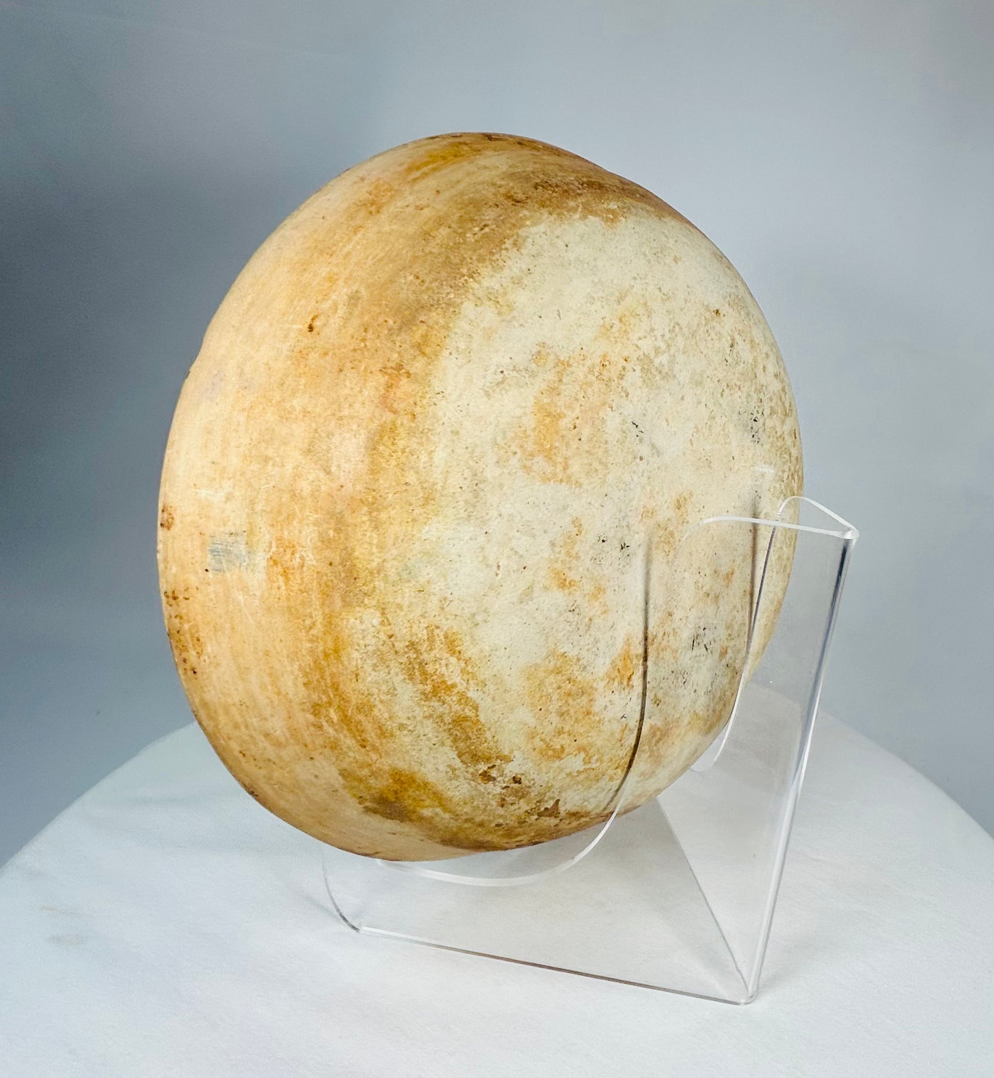 Pre-Columbian ceremonial terracotta bowl with balanced proportions and softened painted motifs.