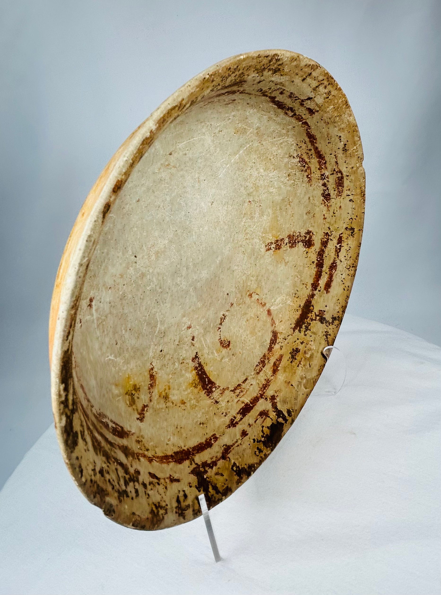 Pre-Columbian clay bowl likely used for ritual or communal purposes, with subtle red-ochre decoration.