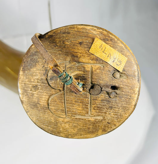 Antique personal powder horn displaying craftsmanship and wear