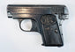 Belgian FN Browning Model 1906 with stamped slide lettering, a curved trigger, and a textured FN-monogram grip.