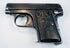 FN Browning Model 1906 Triple Safety variant with an enlarged manual safety lever, slide serrations, and checkered grips.