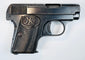 Deactivated 6.35mm Browning Model 1906 with a visible ejection port, oval FN grip emblem, and aged steel finish.