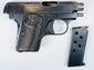 Belgian FN Browning Model 1906 with aged bluing, an FN-monogram grip, and its magazine displayed separately.