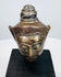 Antique Southeast Asian Buddha head sculpture with serene face, elongated ears, and decorative crown