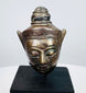 Southeast Asian Buddhist metal sculpture with decorative crown and naturally aged surface