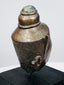 Antique Buddhist devotional head with ornate crown, ushnisha, and tranquil expression