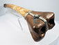 Antique Vajrayana Buddhist kangling human bone trumpet with sculptural dragon carving and ritual symbolism