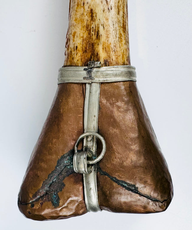 Carved dragon detail on Tibetan Buddhist kangling ritual trumpet made from human femur bone