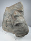 Ancient Classical relief sculpture carved from porous volcanic tuff with heavily weathered figural decoration