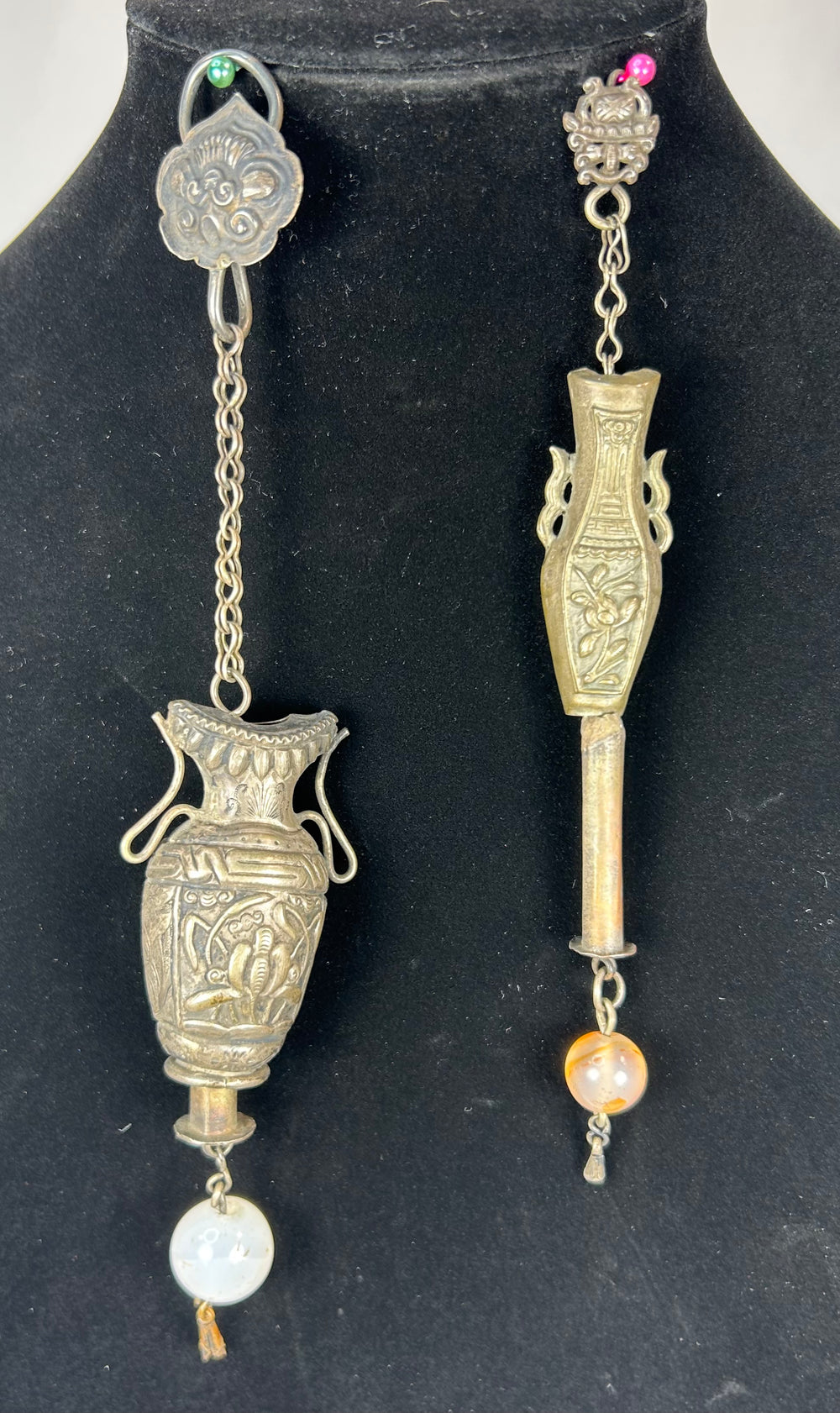 Late 19th century Chinese silver personal adornment with carved vessel form