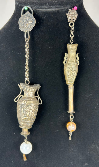 Late 19th century Chinese silver personal adornment with carved vessel form