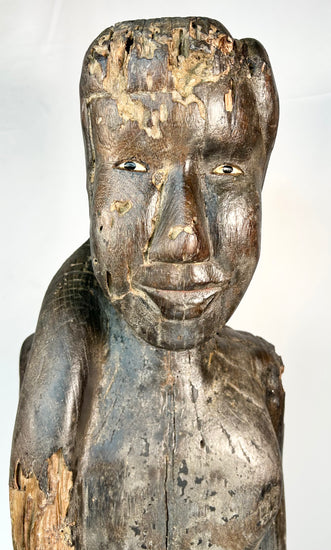 Late 19th century Dayak ritual guardian sculpture mounted on wood base