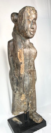 Large antique Borneo wooden ritual figure with elongated proportions