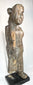 Large antique Borneo wooden ritual figure with elongated proportions