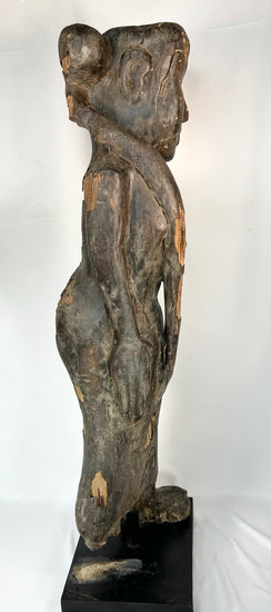 Dayak ancestral guardian sculpture with weathered patina and wood loss