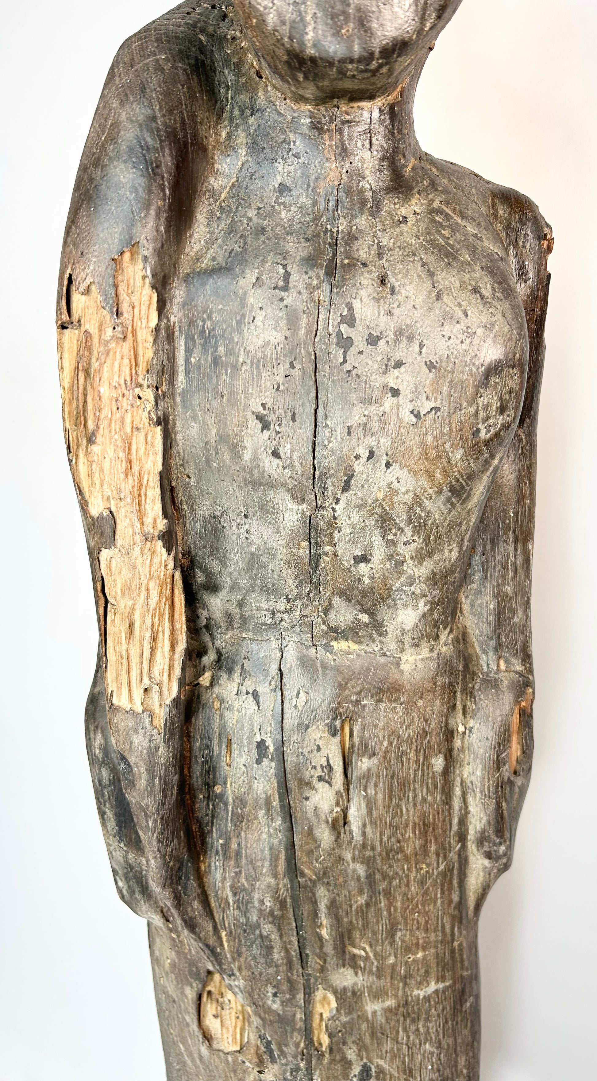 Antique Kalimantan ancestral guardian figure with traditional carving