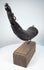 Side view of an 18th–19th century Tibetan ritual horn used in fire-offering ceremonies to dispense mustard seeds.