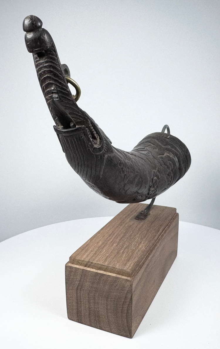 Side view of an 18th–19th century Tibetan ritual horn used in fire-offering ceremonies to dispense mustard seeds.