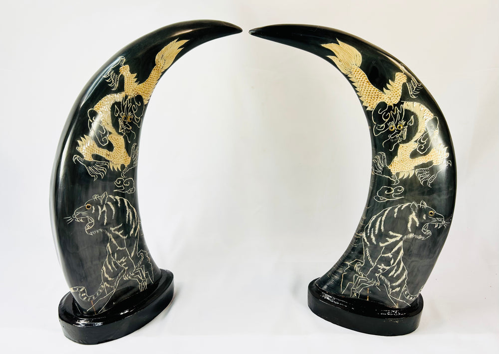 Mid–late 20th-century East Asian water buffalo horn sculptures with etched gold celestial dragons and tigers, circa 1960–1980