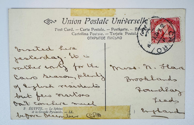 Reverse of an early 20th-century Egypt postcard with handwritten correspondence, Egyptian postage stamp, and Cairo postal cancellation.