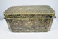 Late 18th to early 19th-century Philippine betel nut box with intricate brass floral inlay and aged mixed-metal surface.