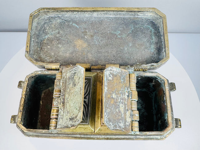 Open betel box with individual inner compartments raised, revealing separate storage sections for traditional betel accoutrements.