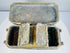 Open betel box with individual inner compartments raised, revealing separate storage sections for traditional betel accoutrements.