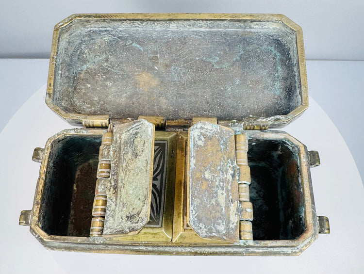 Open betel box with individual inner compartments raised, revealing separate storage sections for traditional betel accoutrements.