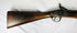 Close-up of the walnut stock and 1864 Enfield lockplate with Victoria cypher on the Snider-Enfield Mk II rifle.