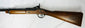 Left-side profile of the 1864 Snider-Enfield Mk II rifle displaying the shortened walnut stock and military steel hardware.