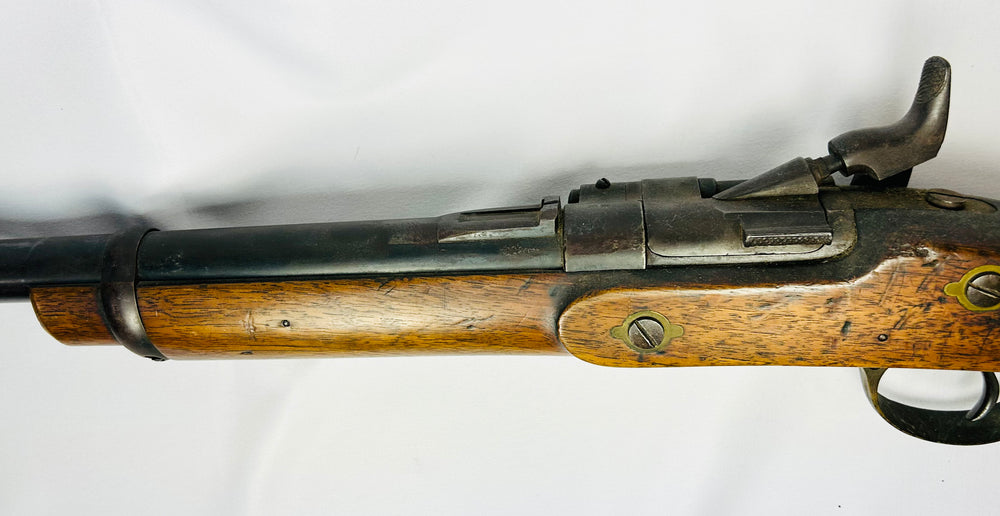 Close-up of the Snider-Enfield Mk II breechblock conversion system and forestock screws with patinated steel surfaces.