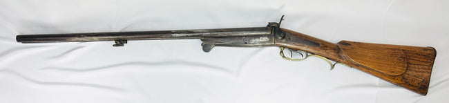 19th century French pinfire sporting shotgun with aged walnut stock and steel barrels