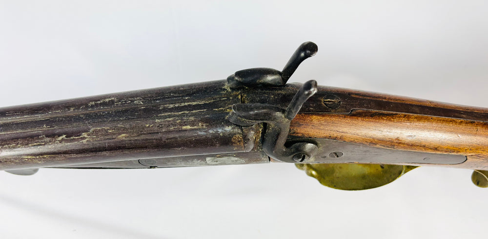 French pinfire underlever shotgun showing transitional firearm technology of the 19th century
