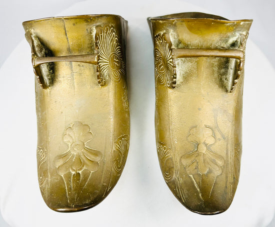 Decorative antique brass stirrup pair used in Latin American equestrian tradition.