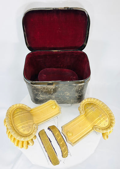 Pair of antique naval officer shoulder epaulettes housed in crimson velvet presentation case