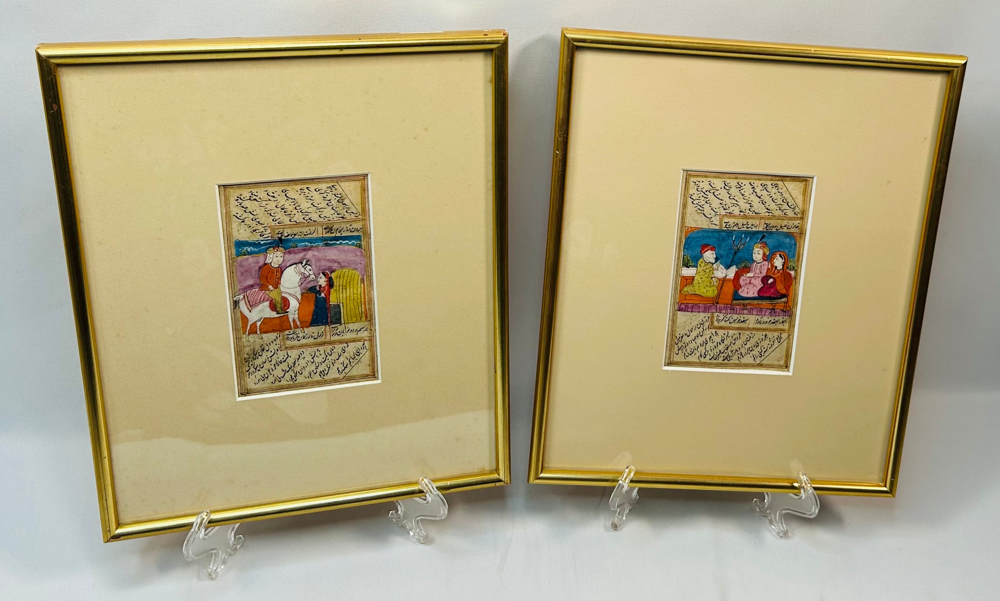 Framed Indo-Persian illustrated manuscript pages with narrative court scenes