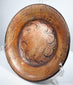 Angled view of Pre-Columbian Greater Nicoya shallow ceramic bowl with central painted medallion