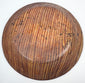 Underside of Greater Nicoya Pre-Columbian ceramic plate with closely spaced reddish-brown painted lines