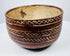 Ceramic bowl with alternating plain bands and interlocking X-shaped decoration.